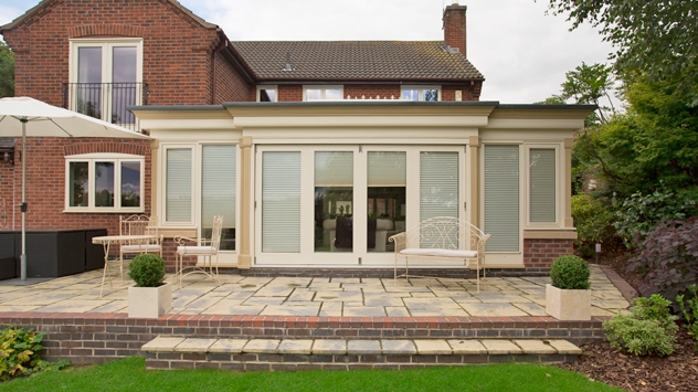 Outdoor external view of pure pleated blinds fitted in an orangery in Leicester