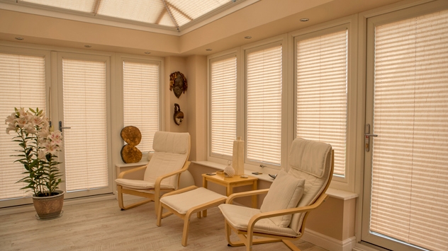 Pleated window blinds in an orangery shown fully extended