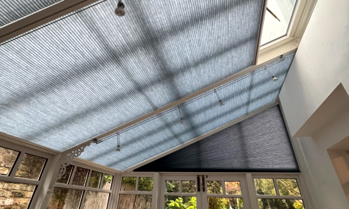 Sleek blinds in a beautiful garden room