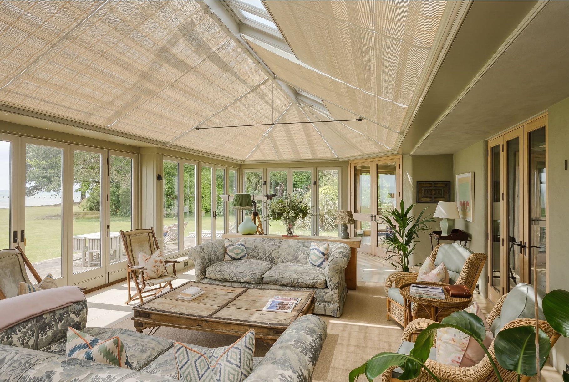 Electric pinoleum roof blinds in a stunning orangery