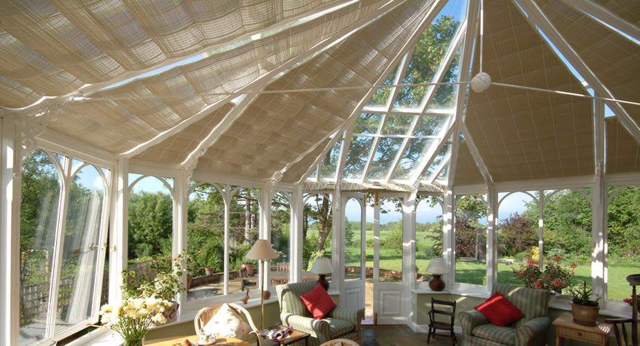 Pinoleum blinds in an Amdega conservatory (part retracted)