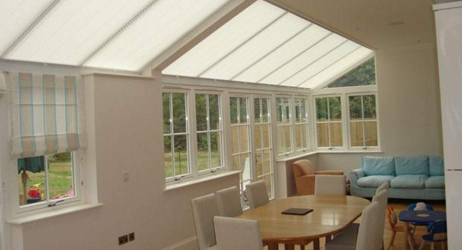 pure Pleated Blinds in an open plan conservatory